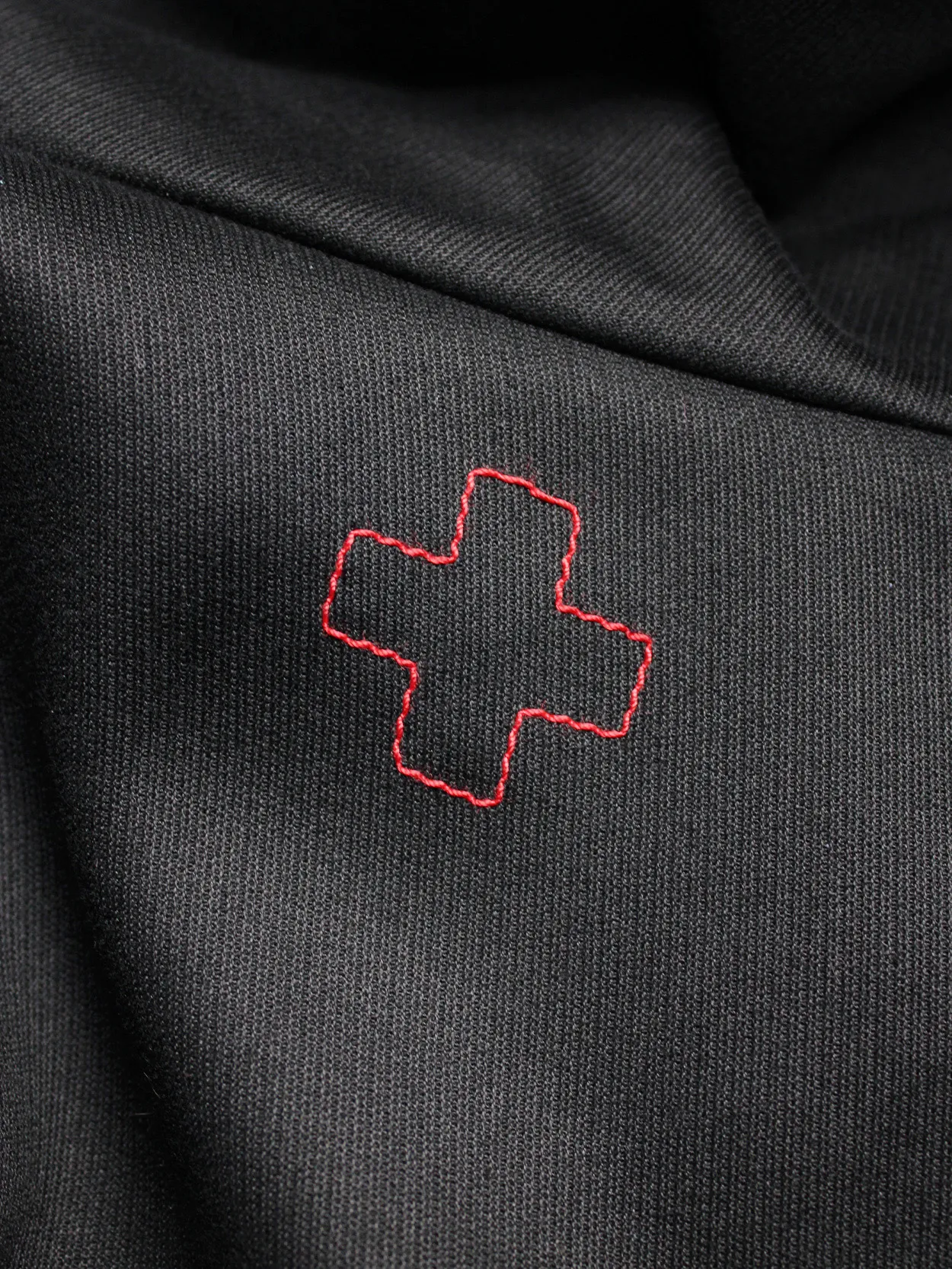 A.F. Vandevorst black jacket with removable velcro cross — spring 1999