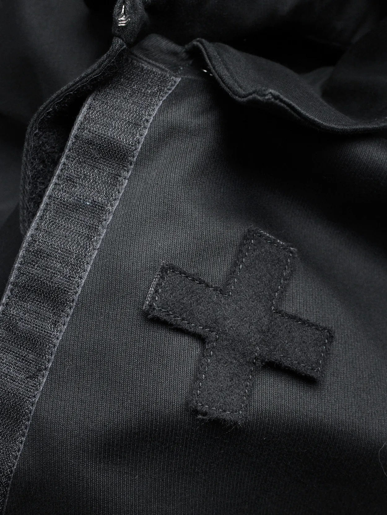 A.F. Vandevorst black jacket with removable velcro cross — spring 1999