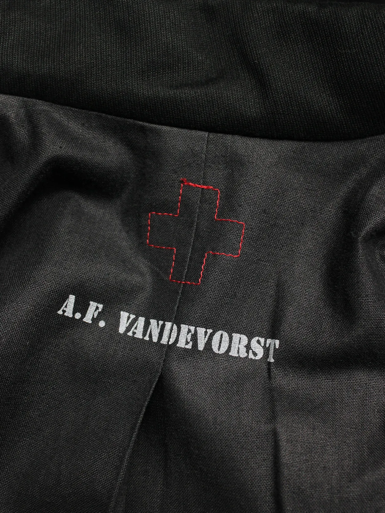 A.F. Vandevorst black jacket with removable velcro cross — spring 1999