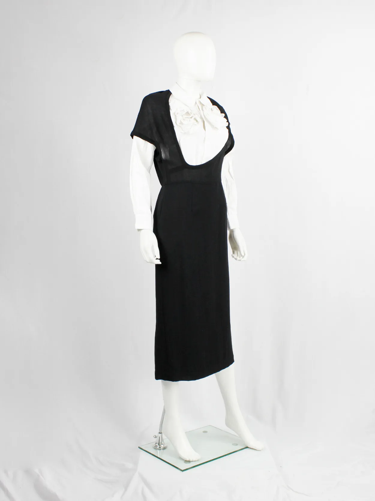 Comme des Garçons black dress with deformed upper and extra low neckline — spring 1999