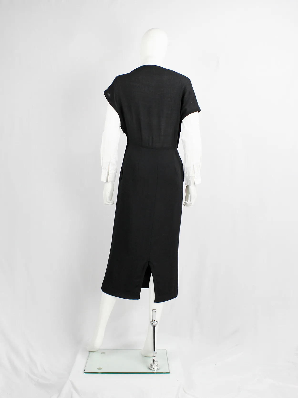 Comme des Garçons black dress with deformed upper and extra low neckline — spring 1999